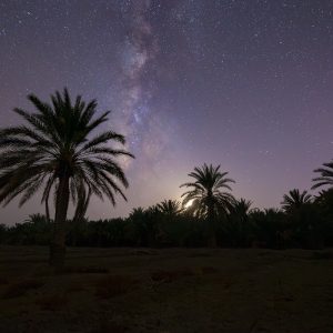 juxtaposition of the moon and the galaxy